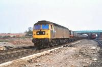 47179 photographed at Knottingley with a train of coal hoppers in April 1980.<br><br>[Peter Todd 14/04/1980]