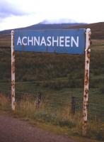 Achnasheen's under-populated hinterland is the backcloth to the rusting station nameboard in summer 1974.<br><br>[David Spaven //1974]