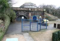 Close up of the north portal of the 1847 Scotland Street Tunnel, seen from the old goods station in January 2013 - now forming part of a basketball court. The west side of Scotland Street itself overlooks the scene with Royal Crescent running off to the right. [See image 5876]<br><br>[John Furnevel 08/01/2013]
