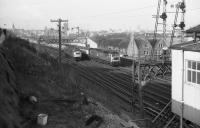 Brush Type 4 no 1623 heads south with a passenger train past Ferryhill signal box on 21 April 1973, as an EE Type 4 heads light engine in the opposite direction towards Aberdeen station.<br><br>[John McIntyre 21/04/1973]