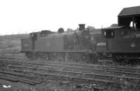 Locomotives 'stored' at Polmont in 1959 included C16 4-4-2T no 67492 and J72 0-6-0T no 69014. Both were ex-64A, with 67492 'officially withdrawn' the following  March and cut up at Cowlairs the same month. As for 69014, withdrawal is recorded as February 1962 with disposal at Arnott Young, Carmyle, in August 1963.<br><br>[K A Gray 27/07/1959]