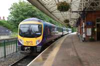 A First TransPennine service to Manchester Airport is about to depart from Poulton-le-Fylde on 16 June 2012.<br><br>[John McIntyre 16/06/2012]