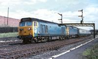 Only a couple of miles from their destination at Glasgow Central, Class 50s Nos. 404+405 are still travelling fast enough to beat the camera as they pass Shawfield, just south of Polmadie, on the 08.15 from Birmingham New Street.<br><br>[Bill Jamieson 19/05/1970]