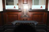 The magnificent woodwork around the booking hall ticketing hatch at Elgin East in February 2013. Sadly too late to purchase a single to Boat of Garten. As it says on the window, now the office of Moray Chamber of Commerce.<br><br>[Brian Taylor 07/02/2013]