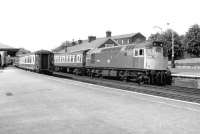 One of Eastfield shed's BRCW Type 2s no 27033 calls at Dumfries on a fine summer Saturday in 1982 with a Glasgow Central - Carlisle extra.<br><br>[John Furnevel 05/06/1982]