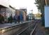 Looking south along the platform at Rolvenden on the K&ESR as ex GWR 0-6-0PT no 1638 approaches the station with a service to Tenterden Town on 23 October 2010. Like a lot of rural railways the station is about 2 miles from the village of the same name, in fact it is closer to Tenterden!<br><br>[John McIntyre 23/10/2010]