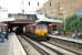 EWS 66142 brings the 15.50 Purfleet - Wembley freight through Dalston Kingsland station on the North London Line on 21 July 2005.<br><br>[John Furnevel 21/07/2005]