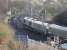 GBRf 66739, formerly Freightliner 66579, heads a long train of coal hoppers north at Deeerness Valley Junction, just south of Durham station. This picture was taken from a viewpoint that has been created on the pier of the old stone bridge that spanned the tracks at this point but was demolished after replacement by a steel one. Even a bench is provided!<br><br>[Mark Bartlett 27/11/2012]