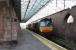 Idling in Platform 3 at Penrith are 66421 and 66423 on the northbound <I>Stobart Tesco Express</I>. On this morning in November 2012 the freight was running late and was diverted into this loop line to allow a Voyager and Pendoline to overtake. The local red sandstone, used in many of Penrith's buildings, can be clearly seen as can the renovated glazed canopy.<br><br>[Mark Bartlett 30/11/2012]