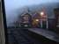 Levisham Station Signal Box and Ticket Office seen at dusk on Sunday 16 December 2012. The steam from 45428 <I>Eric Treacy</I> adds to the haze by the signal box. <br><br>[David Pesterfield 16/12/2012]