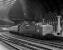 The soaring train sheds of the Victorian era had the practical feature of not trapping smoke at platform level - something which also proved useful during the Deltic era! No. 55001 'St Paddy' arrives at York with the Sunday 09.50 Kings Cross to Edinburgh on 4 July 1976, a dated train hence the use of Mk 1 stock.<br><br>[Bill Jamieson 04/07/1976]