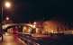 Achnasheen station and hotel seen on a particularly wet night in late 1994. A westbound Sprinter pauses briefly at the station. 'Field of rain' - never a place better named. The hotel was to burn down in 1995 and today it is difficult to believe it was ever there or that there was enough space for it.<br><br>[Ewan Crawford 28/12/1994]