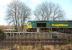 Freightliner 66592, Oxford bound through Didcot on 5 February, passing the new platform at the Didcot Rail Centre.<br><br>[Peter Todd 05/02/2013]