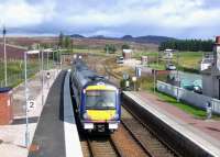 A Glasgow Queen Street - Inverness service runs north through Dalwhinnie station on 25 August 2007.<br><br>[John Furnevel 25/08/2007]