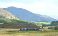 A Glasgow Queen Street - Inverness train just north of Dalwhinnie in August 2007. Photographed looking north west from a layby alongside the A9.<br><br>[John Furnevel 25/08/2007]