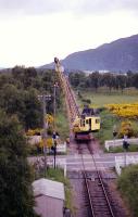 Looking south from the top of the Aviemore Up distant signal on the line from Boat of Garten in July 1991 when the assistance of a rail mounted crane was sought to erect a telegraph pole next to Dalfaber level crossing.<br><br>[John McIntyre /07/1991]