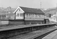 While the rest of the station buildings at Halifax were semi-derelict in the late '70s/early '80s, the signal box still looked spick and span, albeit it was located on the trackless western island platform. <br>
<br><br>[Bill Jamieson //]
