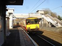 318263 runs under the new footbridge at Hyndland station on 18 February with the 12.31 service to Airdrie. <br><br>[David Pesterfield 18/02/2013]