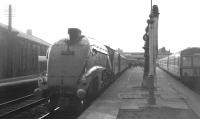 Gresley A4 Pacific no 60019 <I>Bittern</I> calls at Stirling with an Aberdeen - Glasgow Buchanan Street service in 1966. A recently arrived DMU stands alongside at platform 7.<br><br>[K A Gray //]