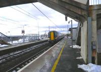 The 15.50 Glasgow Central - North Berwick service arrives at Carluke on 12 March. <br><br>[John Yellowlees 12/03/2013]