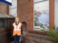 Artist Andrea Keys with her painted window at Ayr Station on 14 March 2013.<br><br>[John Yellowlees 14/03/2013]