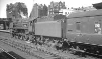 Britannia Pacific no 70001 <I>Lord Hurcomb</I> prepares to take an unidentified northbound train out of Carlisle platform 4 in July 1966. The locomotive was withdrawn from Kingmoor shed two months later.<br><br>[K A Gray 02/07/1966]