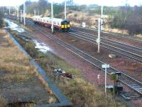 A Lanark - Dalmuir train heads north at Law Junction on 15 December 2002. [See image 6629]<br><br>[John Furnevel 15/12/2002]