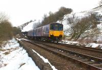In the early stages of the journey from Buxton to Blackpool, Northern 150145 drifts downhill from Dove Holes between Barmoor Clough and Eaves tunnels on 1 April 2013. <br><br>[John McIntyre 01/04/2013]