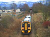 The 1700 Perth - Edinburgh passing the site of Bridge of Earn station<br>
on 4th April 2013.<br><br>[Brian Forbes 04/04/2013]