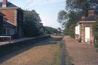 The last train ran through Clare station, Suffolk, in March 1967. Nine years later, on 6th June 1976, the premises were being well cared for as part of Clare Castle country park. This view is east towards Cavendish. It is still available to visit today, with a small museum housed in the former goods shed.<br><br>[Mark Dufton 06/06/1976]