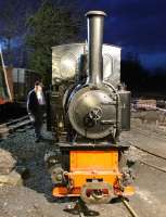 After several round trips with an evening private charter West Lancs Fireman (and Railscot contributor) John McIntyre contemplates the disposal tasks for 0-4-0T <I>Utrillas</I> on 17 April. First stop the ashpan!<br><br>[Mark Bartlett 17/04/2013]