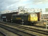 Freightliner 86607 is stabled on a short rake of intermodal flats alongside Arriva's London and North Western maintenance facility located between the West Coast and Alsager lines south of Crewe Station on 16 April. <br><br>[David Pesterfield 16/04/2013]