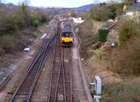 Looking East towards London and the site of Bathampton station (the white buildings just to the right of the unit) on 30 March, as the 17.08 to Gloucester comes off the line from Weymouth, heading for Bath.<br><br>[Ken Strachan 30/03/2013]