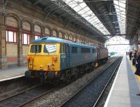 Scene at Preston station on 11 April 2013, with  WCRC 47245 hauling 87002, the last mainline registered Class 87 locomotive, on its way from Carlisle to Willesden. <br><br>[John McIntyre 11/04/2013]