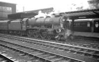 Waiting to leave Carlisle platform 4 southbound on 19 April 1962 is Polmadie Royal Scot no 46105 <I>Cameron Highlander</I>. The train is the 10.50am Glasgow Central - Liverpool Exchange. [See image 29719]<br><br>[K A Gray 19/04/1962]