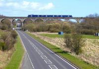 A Saltire-liveried 170 heads south over Markinch viaduct. View east on 29 April. <br><br>[Bill Roberton 29/04/2013]