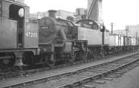 Fowler ex-LMS 2-6-2T no 40022 on shed at Kentish Town (14B) in October 1962. Nearest the camera is 3F 0-6-0T 47202 (of 1899 vintage). Both locomotives are fitted with condensing apparatus for operating over the Metropolitan widened lines.<br><br>[K A Gray 28/10/1962]