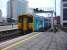 150213 in latest Arriva Trains Wales livery, as applied to its refurbished 158 DMUs, exits the east end of platform 6 at Cardiff Central as it heads for Merthyr Tydfil. <br><br>[David Pesterfield 11/02/2013]