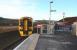 158722 arrives at Conon Bridge with the 16:19 to Inverness (12.36 ex-Wick) on 18 February 2013. View north showing the station entrance, bicycle shelter/lockers and part of the eight space car park. A footpath to the village is still under construction off to the right.<br><br>[John Gray 18/02/2013]