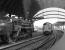 92220 <I>Evening Star</I> stands on the down through line between platforms 8 and 9 at York while waiting to take over the 'The Scarborough Flyer' excursion' on 4 July 1976 [see image 40958]. On the right 37101 approaches on the up through line with excursion 1Z24, destination unknown. The displaying of reporting numbers had been officially abandoned some months previously and this was a rare exception to the new rules.<br><br>[Bill Jamieson 04/07/1976]