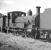 The shed yard at Eastleigh in August 1960, with Beattie 2-4-0WT no 30585 in the sidings. The 1874 veteran was withdrawn from Wadebridge (72F) at the end of 1962. No 30585 is now preserved and operational at the Buckinghamshire Railway Centre, Quainton Road.<br><br>[K A Gray 09/08/1960]