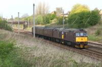Seeing a Class 33 on the main line is fairly rare these days but two together is a special event. WCRC 33207 and 33029 head south of Farington Curve Jct on the WCML with the 5Z42 Carnforth to Southall ecs move on 7 May 2013.<br><br>[John McIntyre 07/05/2013]