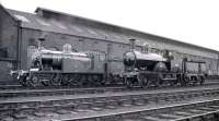 Caledonian Railway 4-2-2 'Single' no 123 poses with LNWR 2-4-0 'Precedent' no 790 <I>Hardwicke</I> alongside Kingmoor shed on 30 August 1958. [See image 33618]<br><br>[K A Gray 30/08/1958]