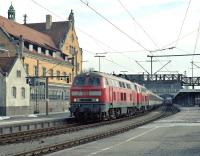 Just half an hour after arrival in Lindau, 218 404 (leading) and 400 are already attached to their returning working to Mnchen, train EC195 from Zrich Hbf.  The emu on the right is an Austrian class 4024 set on a stopping service to Bludenz.<br><br>[Bill Jamieson 07/03/2013]