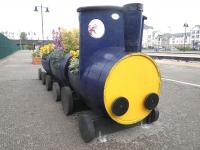 A colourful addition to the platforms at Stirling is this barrel-train planter, looked after by volunteers from Stirling Rotary Club.<br><br>[John Yellowlees 10/05/2013]