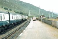 Collecting the mail off the train from Inverness at Helmsdale in 1980. [See image 35626]<br><br>[Ian Dinmore //1980]