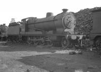 Class O4 2-8-0 no 63584 on Ardsley shed in September 1962, a month after official withdrawal by BR.<br><br>[K A Gray 08/09/1962]