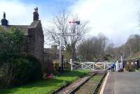 Closing the level crossing gates at Oakwaorth, April 2013.<br><br>[Colin Alexander 27/04/2013]