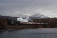 After a lengthy pause at Achnasheen the Great Britain continues east. The train is seen here at the east end of Loch a' Chuillinn midway between Achanalt and Lochluichart.<br><br>[Ewan Crawford 26/04/2013]