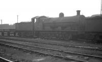 Class G1 0-8-0 no 49137 stands in the sidings at Edge Hill, Liverpool, on a murky day in April 1962. The locomotive had been officially withdrawn by BR approximately 6 months earlier. <br><br>[K A Gray 15/04/1962]